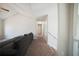 View of a living room from the stairs and hallway at 660 Allens Landing Dr, Lawrenceville, GA 30045