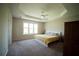 Spacious main bedroom with ceiling fan and a window for natural light at 660 Allens Landing Dr, Lawrenceville, GA 30045