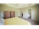 Main bedroom features ceiling fan and a view of the closet and bathroom at 660 Allens Landing Dr, Lawrenceville, GA 30045