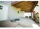 Covered patio with stairs, offering a shady spot for outdoor relaxation at 660 Allens Landing Dr, Lawrenceville, GA 30045