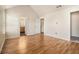 Spacious primary bedroom featuring vaulted ceilings and gleaming hardwood floors at 680 Barshay Dr, Covington, GA 30016