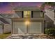 Charming home featuring a two-car garage and a welcoming exterior at 680 Barshay Dr, Covington, GA 30016