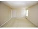 Large bedroom with neutral carpet and paint at 988 Vintage Pointe Dr, Lawrenceville, GA 30044