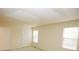 Spacious bedroom with tray ceiling and neutral carpet at 988 Vintage Pointe Dr, Lawrenceville, GA 30044