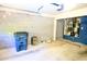 Unfinished garage featuring cinder block walls, concrete floor, and utility access at 988 Vintage Pointe Dr, Lawrenceville, GA 30044