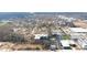 Sprawling aerial view showcases the building with its amenities nestled in the surrounding landscape at 130 Arizona Ne Ave # 214, Atlanta, GA 30307