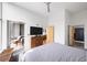 Bedroom with ensuite bathroom and walk in closet; sliding door leads to outdoor patio at 130 Arizona Ne Ave # 214, Atlanta, GA 30307