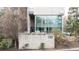 Modern building exterior showcasing large windows and architectural landscaping at 130 Arizona Ne Ave # 214, Atlanta, GA 30307