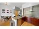 Cozy eat-in kitchen, with granite counter tops, stainless appliances and space to dine at 130 Arizona Ne Ave # 214, Atlanta, GA 30307