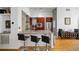 Kitchen view featuring stainless steel appliances, granite countertops, and breakfast bar at 130 Arizona Ne Ave # 214, Atlanta, GA 30307