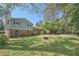 Expansive backyard of this two-story home offers plenty of room for play and relaxation at 1461 Sanden Ferry Dr, Decatur, GA 30033