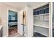 Bathroom view leading to a bedroom, highlighting ample closet space and stylish design at 1461 Sanden Ferry Dr, Decatur, GA 30033
