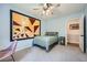 Comfortable bedroom with modern wall art, and a cozy desk area at 1461 Sanden Ferry Dr, Decatur, GA 30033