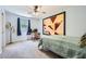 Cozy bedroom with unique wall art, desk area, and comfortable furnishings at 1461 Sanden Ferry Dr, Decatur, GA 30033
