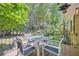 Relax on the home's deck, perfect for outdoor gatherings and enjoying the weather at 1461 Sanden Ferry Dr, Decatur, GA 30033