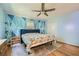 Spacious main bedroom featuring blue accent wall with geometric design and a cozy rug at 1461 Sanden Ferry Dr, Decatur, GA 30033