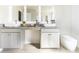 Elegant bathroom features a dual sink vanity with granite countertops and modern fixtures at 149 Weldon Rd, Mcdonough, GA 30253