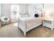 Charming bedroom with pink accents, a plush rug and natural light at 149 Weldon Rd, Mcdonough, GA 30253