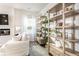 Bright living room showcasing modern shelving, large windows, and comfortable seating at 149 Weldon Rd, Mcdonough, GA 30253