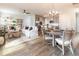 Open-concept living space with a modern kitchen, dining area, and comfortable living room at 149 Weldon Rd, Mcdonough, GA 30253