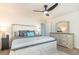 Spacious main bedroom featuring neutral tones, soft bedding, and ample natural light at 149 Weldon Rd, Mcdonough, GA 30253