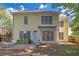 Large backyard with a patio, seating, and lush green space at 1549 Tappahannock Trl, Marietta, GA 30062