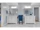 Elegant bathroom with dual vanities, marble countertops, and modern fixtures at 1549 Tappahannock Trl, Marietta, GA 30062