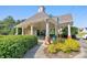 Community clubhouse with picnic tables and manicured landscaping at 1549 Tappahannock Trl, Marietta, GA 30062