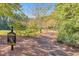 East Park trail for the community with a pet waste station and walking path at 1549 Tappahannock Trl, Marietta, GA 30062
