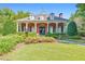 Charming single-Gathering home with dormer windows, a brick chimney and an inviting front yard at 1549 Tappahannock Trl, Marietta, GA 30062