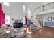 Bright, open living room with tall ceilings, large windows, hardwood floors, and stylish decor at 1549 Tappahannock Trl, Marietta, GA 30062