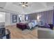 Spacious main bedroom featuring a vaulted ceiling, hardwood floors, and a cozy sitting area at 1549 Tappahannock Trl, Marietta, GA 30062