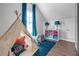Playroom with a teepee, hardwood floors, and colorful decor at 1549 Tappahannock Trl, Marietta, GA 30062
