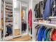 Organized walk-in closet with custom shelving and ample storage space at 1549 Tappahannock Trl, Marietta, GA 30062
