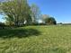 Large lot with mature trees and an open grassy area, perfect for building your dream home at 2085 Jones Phillips Rd, Dacula, GA 30019