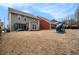 Spacious backyard with a playset, offering a versatile outdoor space for entertainment at 214 Gaston Ct, Canton, GA 30115