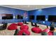 The game room has TVs, game chairs, bean bags, and a Spiderman design on the wall at 214 Gaston Ct, Canton, GA 30115