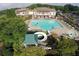 Aerial view of the pool with slide and seating area at the community clubhouse at 214 Gaston Ct, Canton, GA 30115