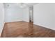 Spacious bedroom with beautiful hardwood floors and a view to walk-in closet at 3972 Church View Ln, Suwanee, GA 30024