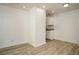 Bright dining area showcasing modern floors, fresh paint, and easy access to the kitchen at 2437 Clarissa Nw Dr, Atlanta, GA 30318