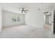 Large bedroom with carpet, a ceiling fan, and natural light at 244 Saint Patrick Sw Dr, Mableton, GA 30126