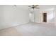 Bright bedroom features neutral carpet and doorways leading to other rooms at 244 Saint Patrick Sw Dr, Mableton, GA 30126