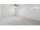 Bright bedroom features neutral carpet, ceiling fan and natural light at 244 Saint Patrick Sw Dr, Mableton, GA 30126