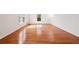 Spacious room featuring hardwood floors, lots of natural light and white walls at 244 Saint Patrick Sw Dr, Mableton, GA 30126