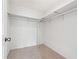 Walk-in closet with shelving and carpet flooring at 244 Saint Patrick Sw Dr, Mableton, GA 30126