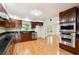 Spacious kitchen with stainless steel appliances and dark wood cabinetry at 244 Saint Patrick Sw Dr, Mableton, GA 30126