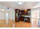 Open concept kitchen featuring stainless appliances and breakfast bar area at 244 Saint Patrick Sw Dr, Mableton, GA 30126