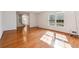 Large living room area featuring hardwood floors and lots of natural light at 244 Saint Patrick Sw Dr, Mableton, GA 30126