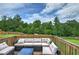 Enjoy an outdoor view from this back deck with furniture and a beautiful forest view at 419 Murphy Ave, Canton, GA 30114
