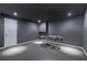 Basement area features black walls and carpet, recessed lighting and a closed white door at 419 Murphy Ave, Canton, GA 30114